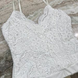 Large white lace bodysuit